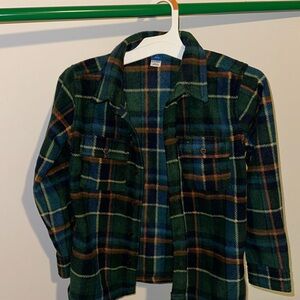 Long sleeved fleece button down top.